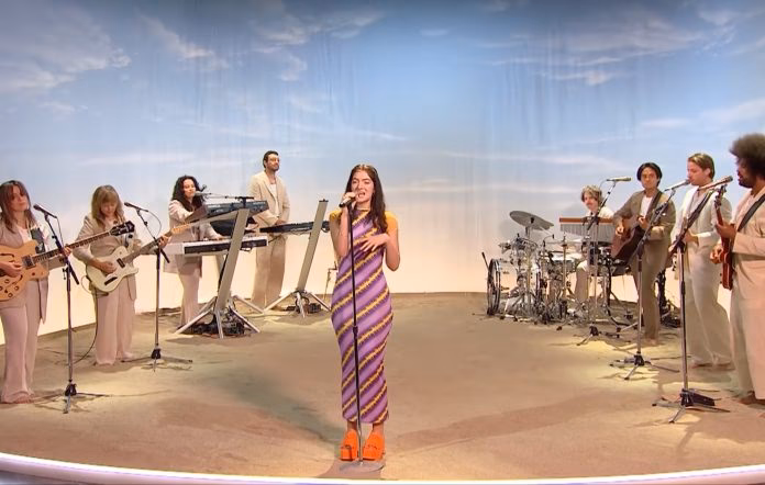 Who is on the Solar Power album cover?