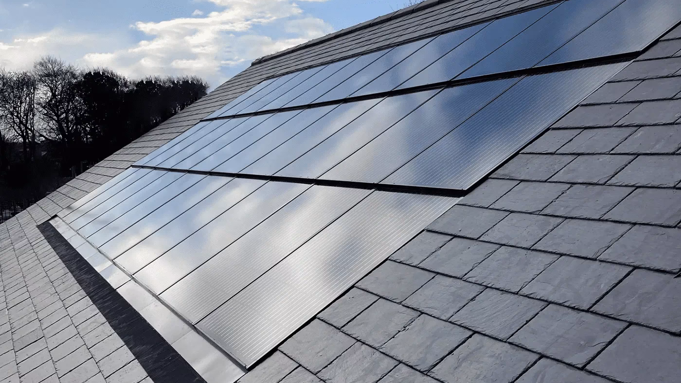 How are solar panels attached to roof tiles?