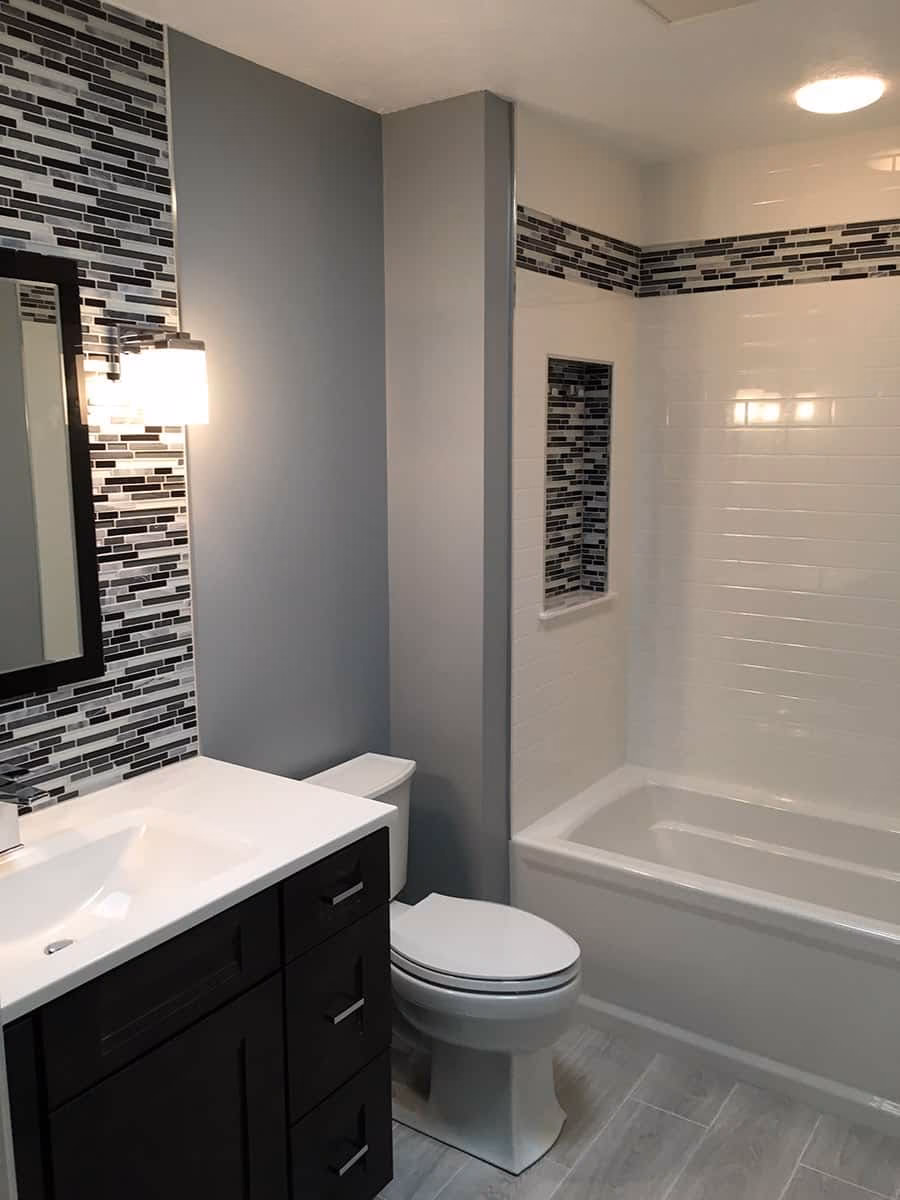 Are Corian shower walls expensive?