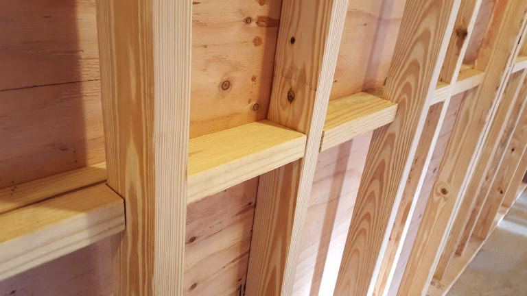 What is considered a wood structural panel?